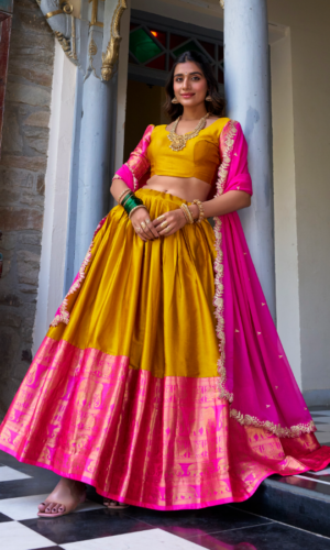 FULLY STITCHED
Mustard Yellow & Rani Pink Silk Lehenga With Intricate Elephant Zari Border